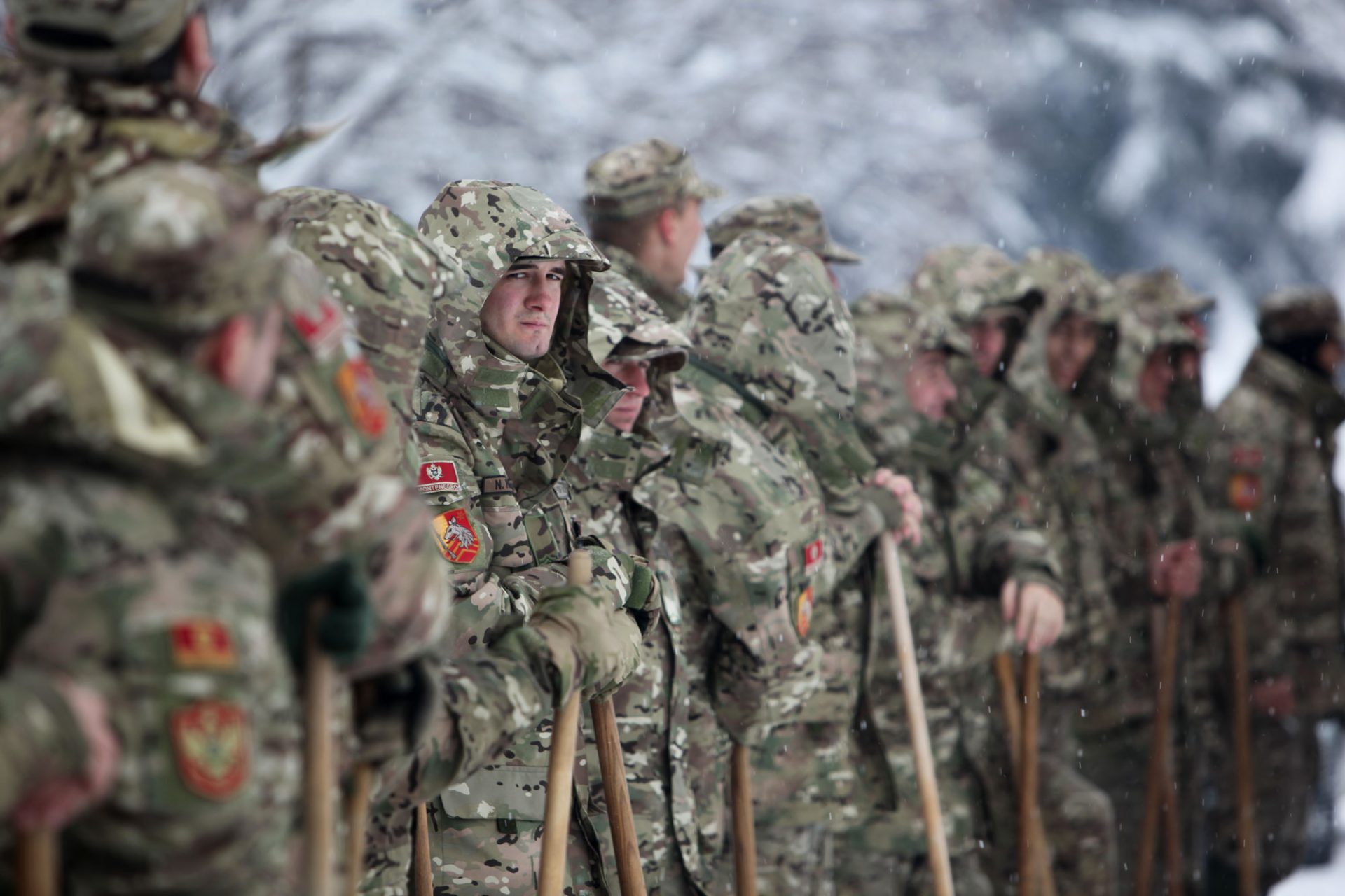 Montenegrin soldiers standing side by side with all NATO members CdM